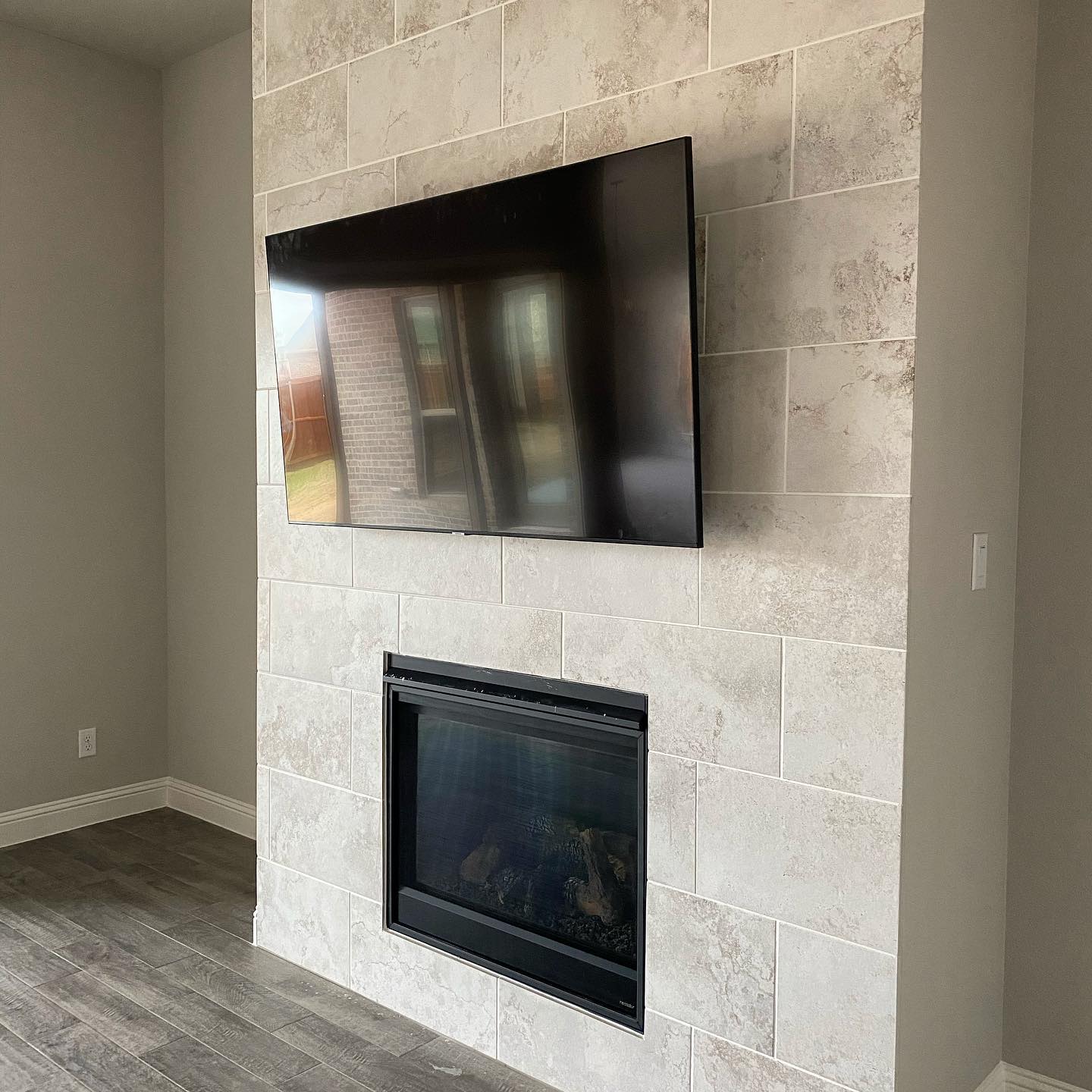 TV mount over fireplace