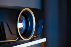 a close up of a projector on a shelf